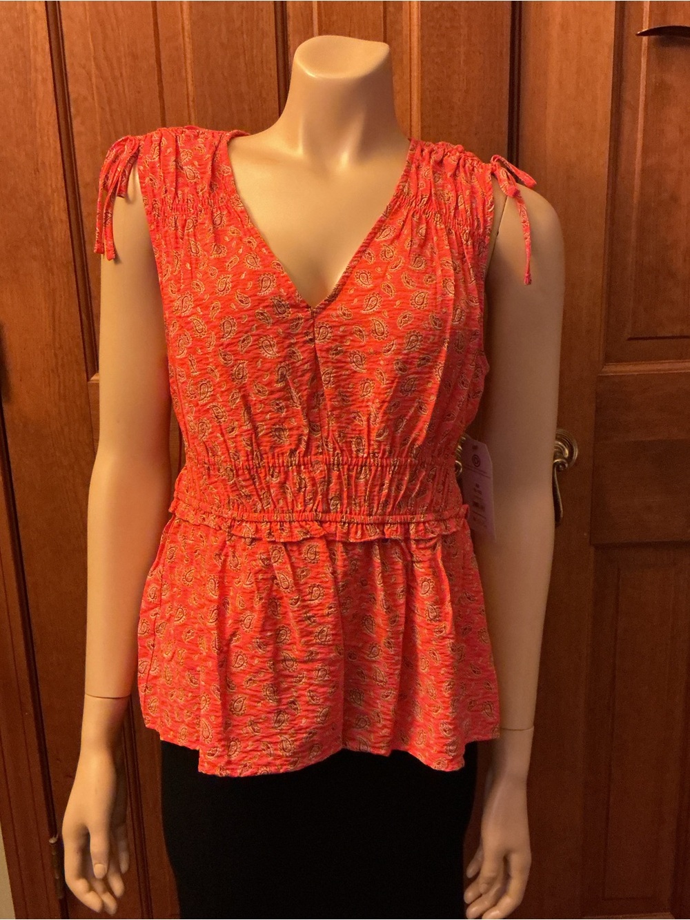 Time and True Coral Sleeveless V-Neck Peplum Top